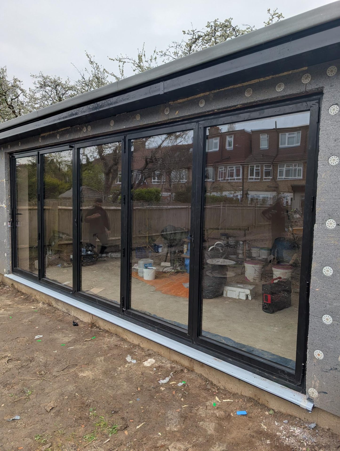 Aluminium bifold door installation by ALU Doors