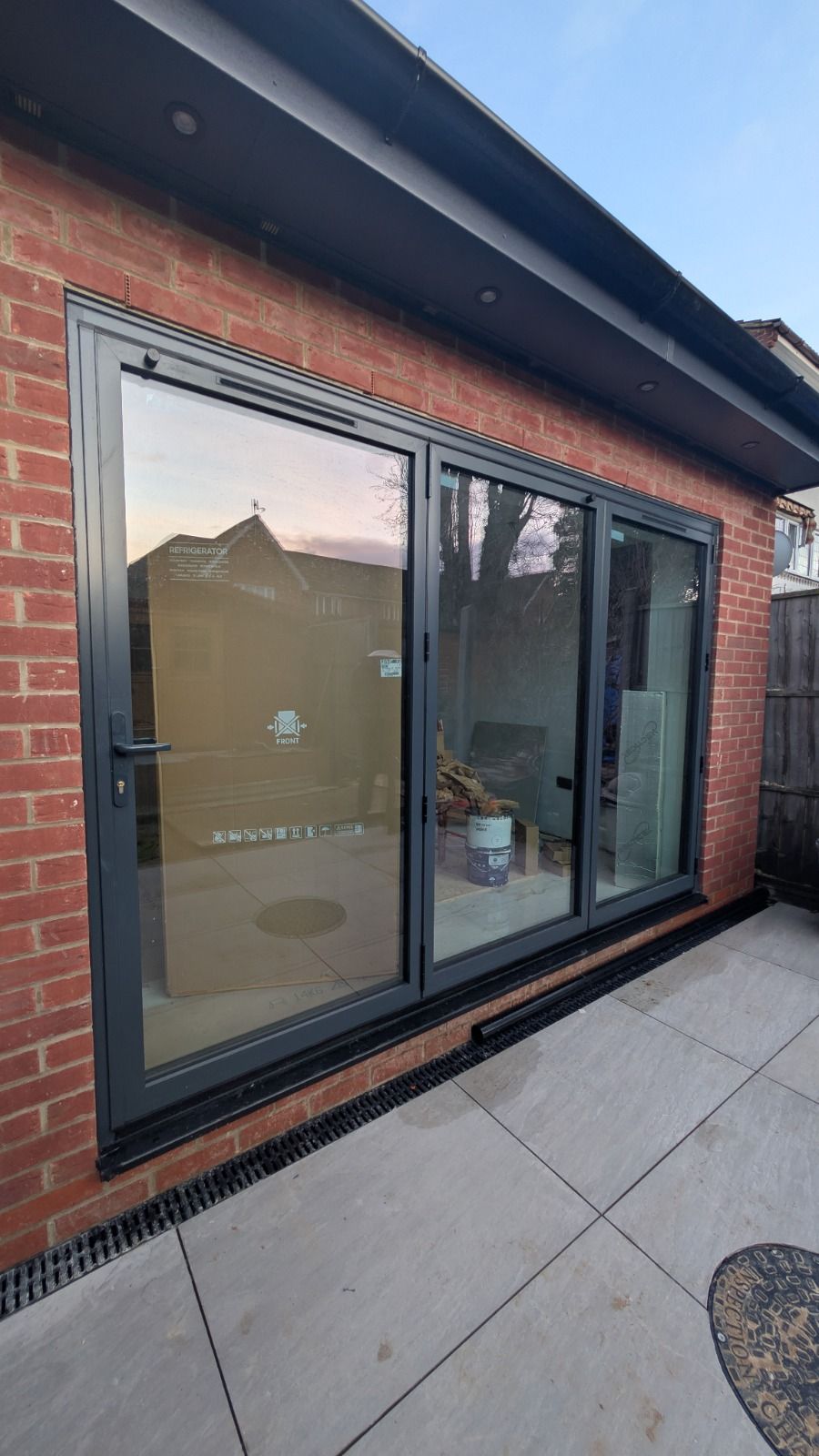 3-pane aluminium bifold door installation by ALU Doors